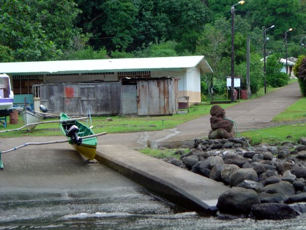 The boat dock combine old and new world, outrigger with an outboard